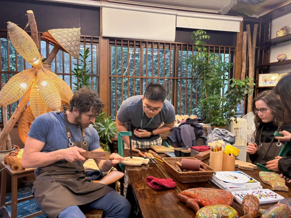 Wood carving workshop in Hanoi Floating cake and tea tasting Unique experiences in Hanoi Hanoi culinary Tea Tasting Hanoi Moc Thon Woodtales