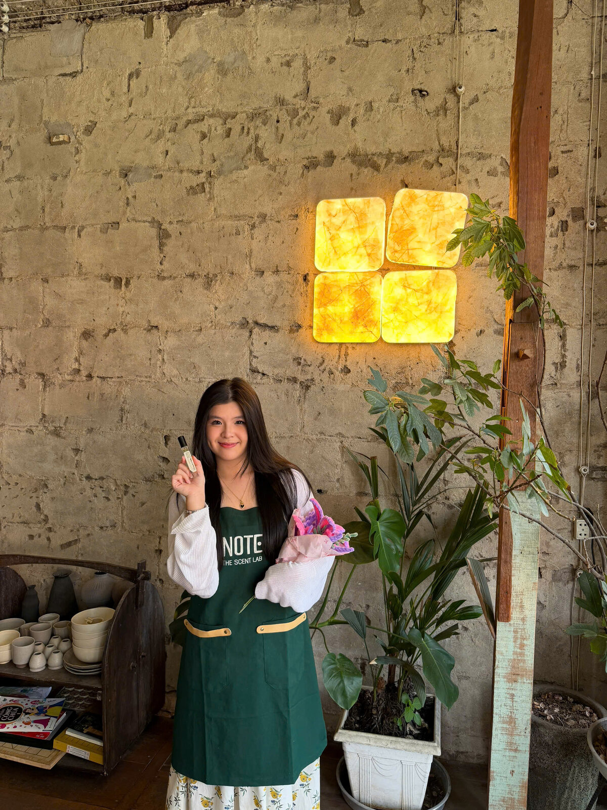 Happy visitor with handmade perfume Vietnam