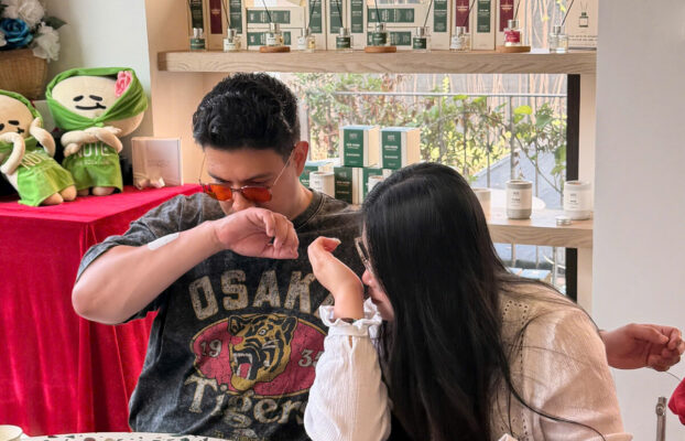 japanesetravelerscouplesmelling Perfume Workshop by NOTE The Scent Lab Couple smelling fragrance at NOTE perfume workshop Vietnam experience