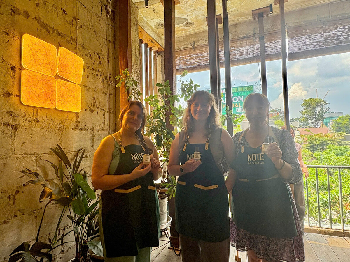 Korean friends posing at perfume workshop Saigon