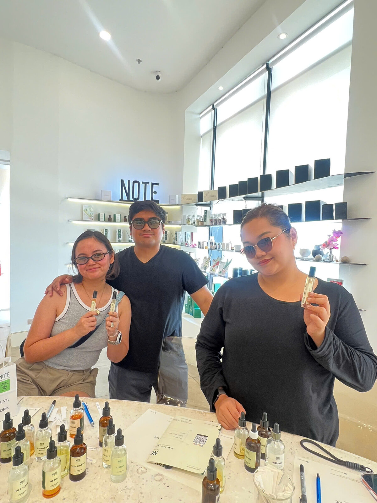 NOTE workshop gift card recipient creating custom perfume at Saigon studio