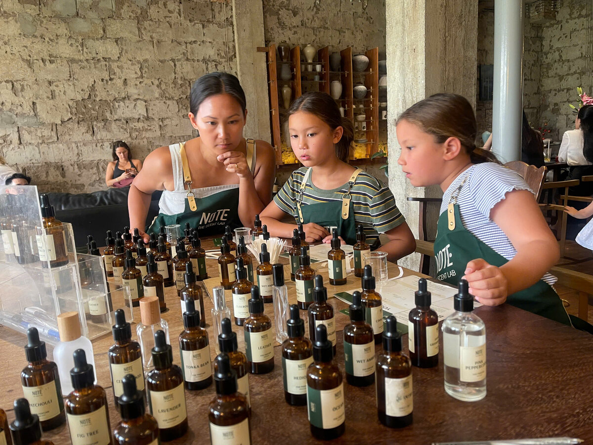 International visitors creating custom perfume in Saigon — 7-day combo finale