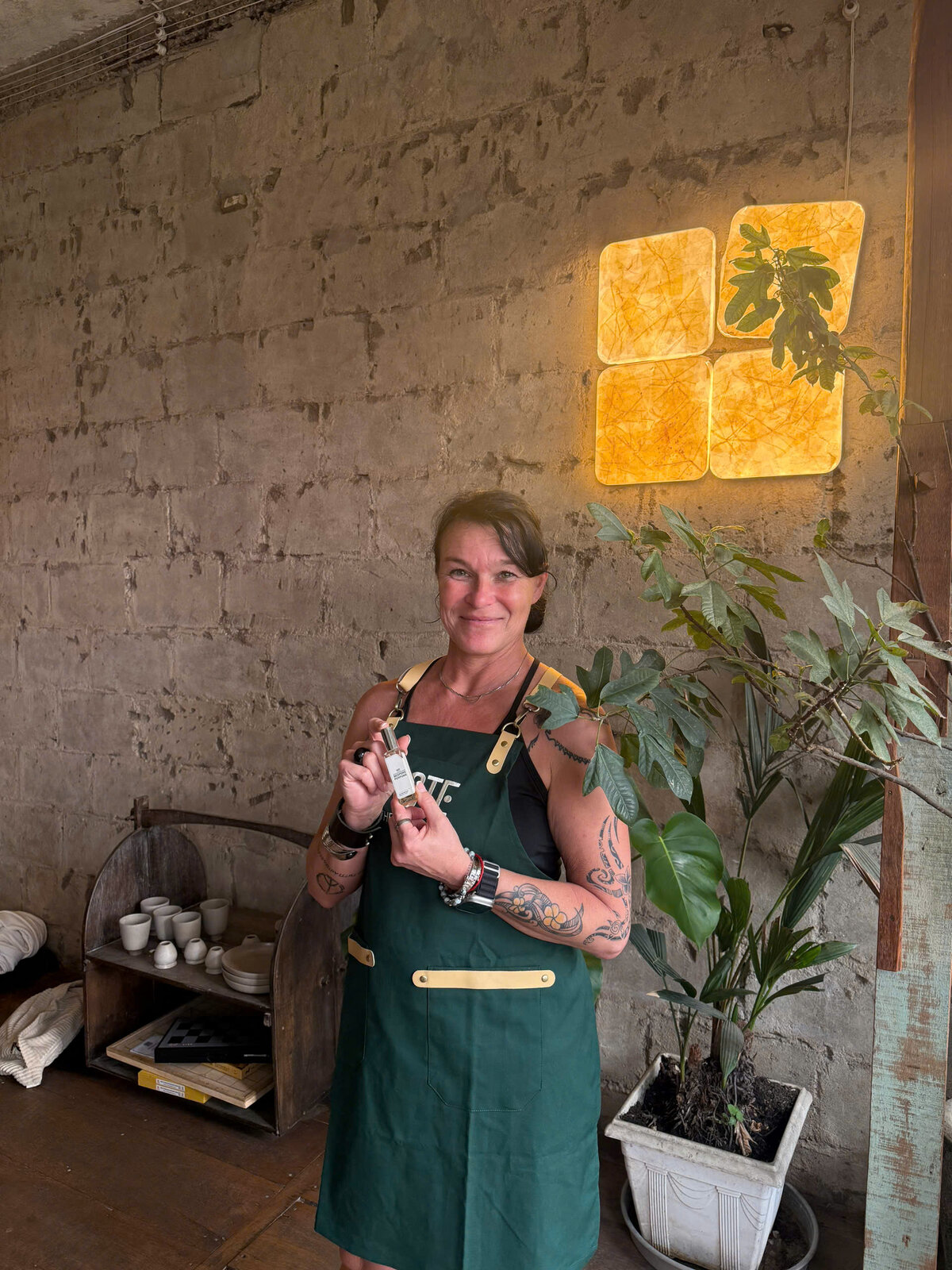 Solo visitor with finished custom perfume at Cafe Apartment Saigon