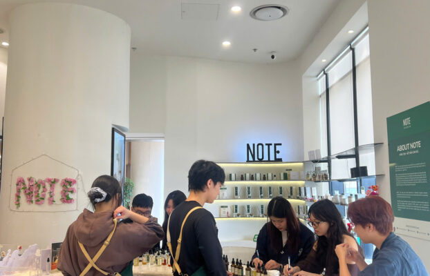 Tour group at perfume workshop in Lotte Mall Hanoi  guided experience