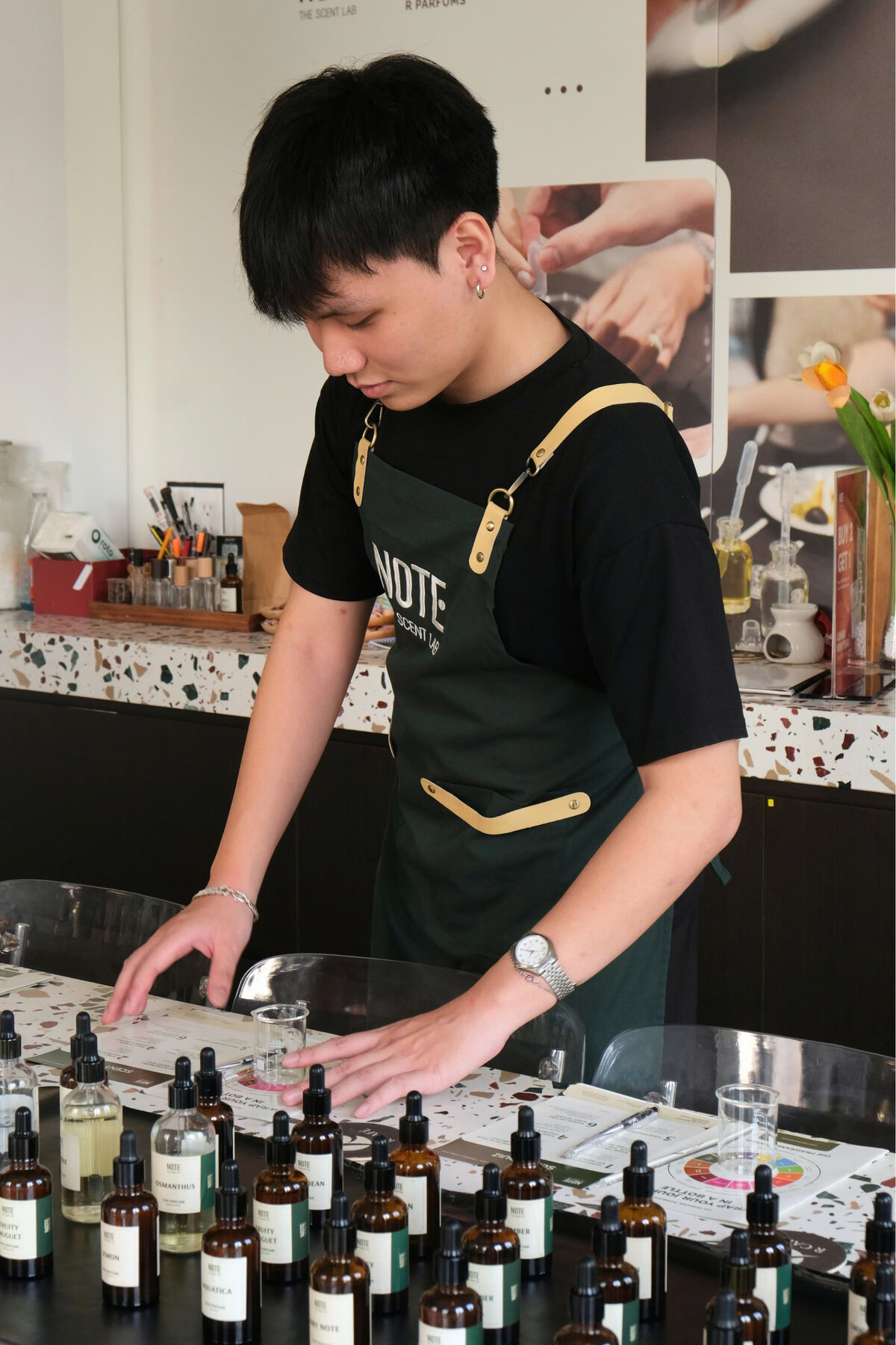 travelers enjoying perfume making at NOTE Saigon workshop