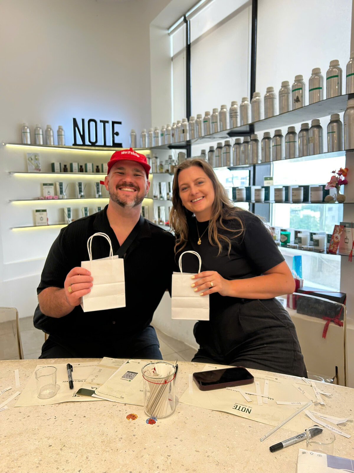 travelers making personalized perfume at NOTE workshop Hanoi