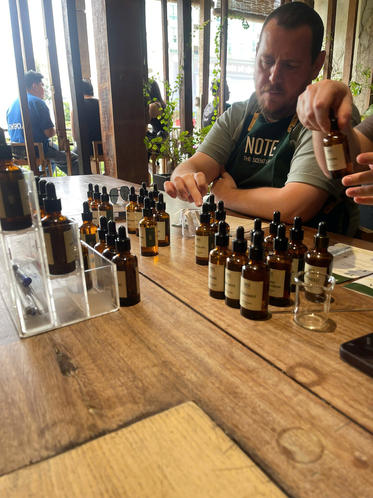 Perfume ingredients table at NOTE workshop