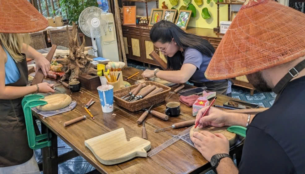 Wood carving workshop in Hanoi traditional Vietnamese wood carving unique experiences in Hanoi craft workshops in Hanoi Moc Thon Woodtales